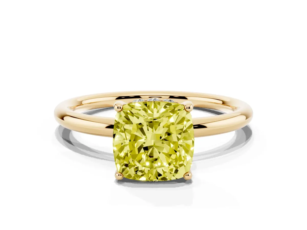 Fancy Yellow Cushion Cut Solitaire Diamond Ring with a Classic Band and Four-Prong Setting Yellow gold