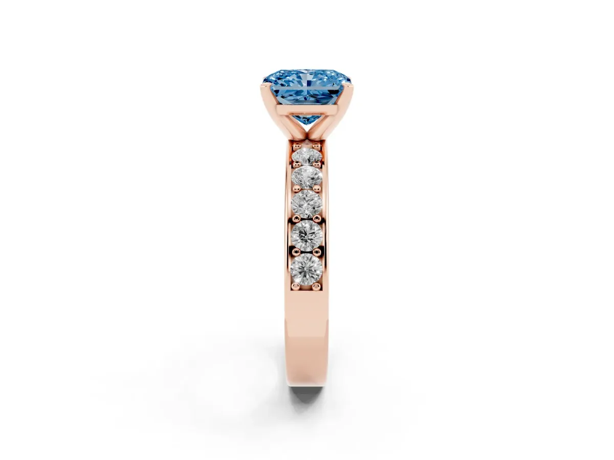 Fancy Blue Radiant Cut Diamond Engagement Ring with Channel Set Round Band and Prong Setting Rose gold