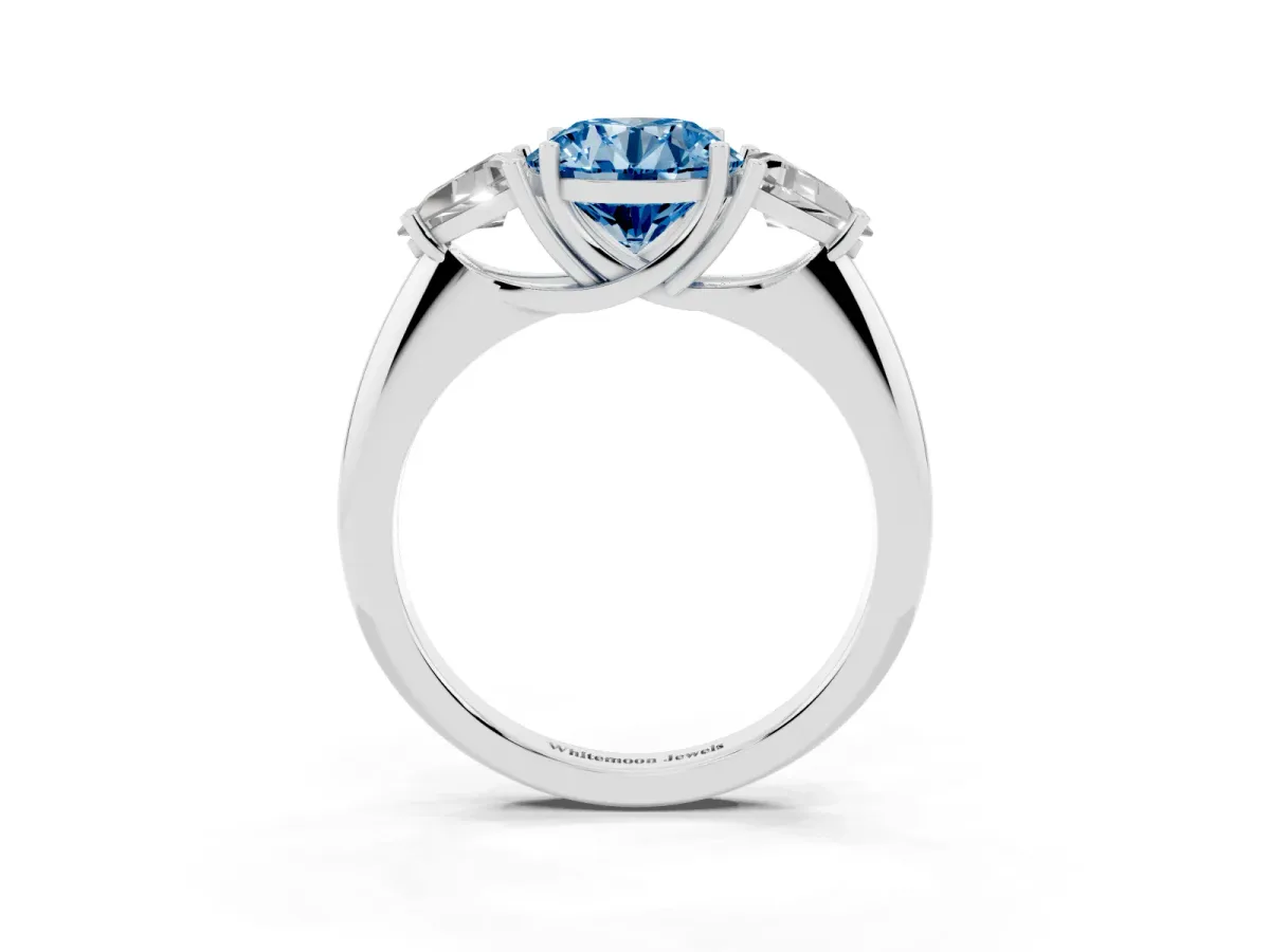 Fancy Blue Three-Stone Round Cut Diamond Engagement Ring with Trillion Side Stones and Prong Setting Silver