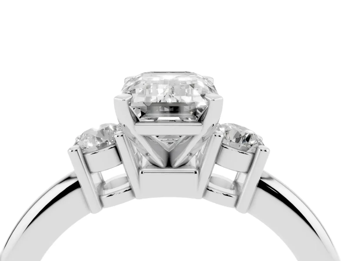 Three-Stone Emerald Cut Cut Diamond Solitaire with Prong Setting and Classic Band Silver