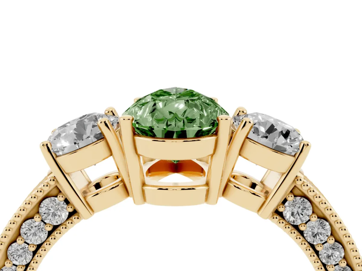 Fancy Green Pear Cut Three-Stone Diamond Ring with Pavé Band and Four-Prong Setting Yellow gold