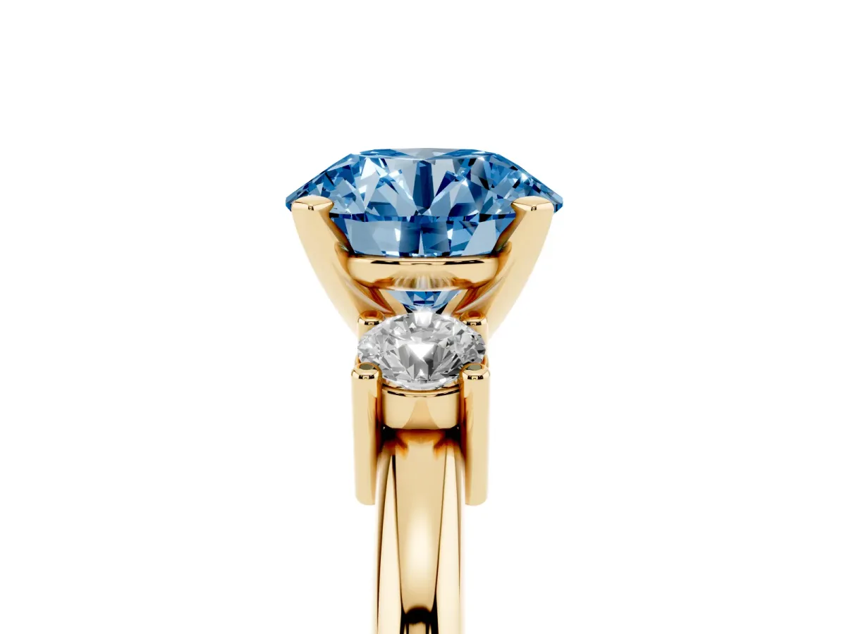 Fancy Blue Three-Stone Round Cut Cut Diamond Solitaire with Prong Setting and Classic Band Yellow gold