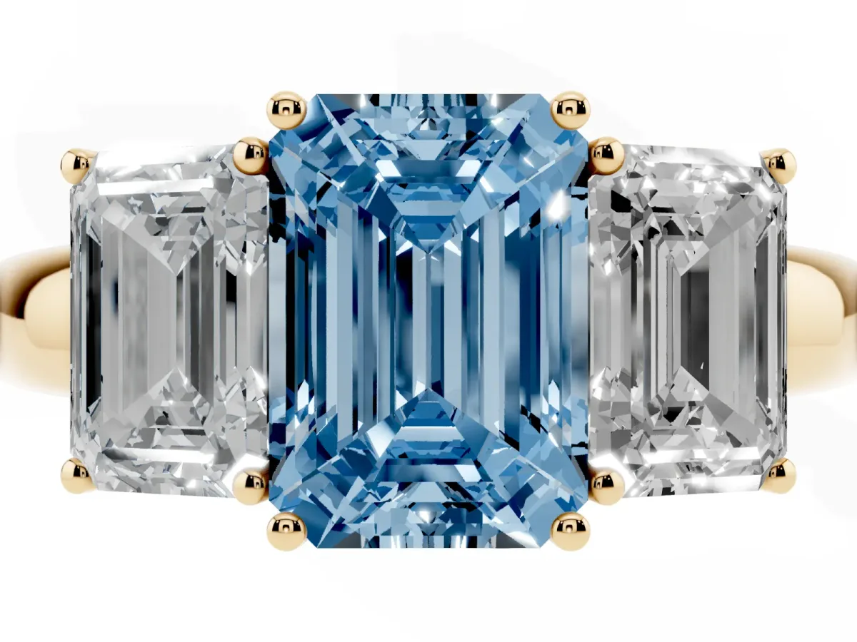 Fancy Blue Emerald Cut Diamond Three-Stone Ring with Four-Prong Setting and Classic Band Yellow gold