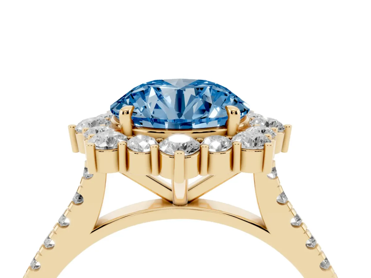 Fancy Blue Round Cut Halo Diamond Ring with Pavé Band and Prong Setting Yellow gold