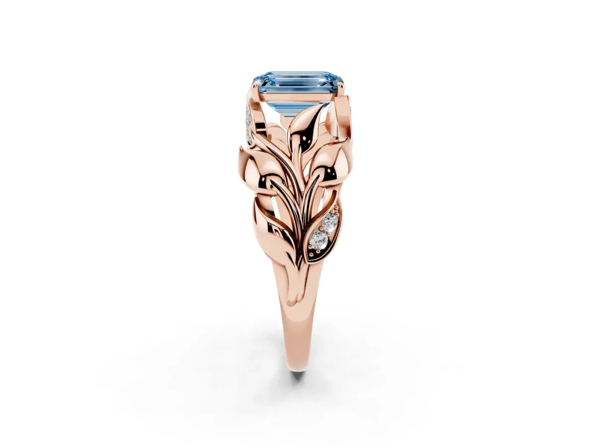 Fancy Blue Emerald Cut Diamond Leaf-Inspired Engagement Ring with Round Accents and Prong Setting Rose gold