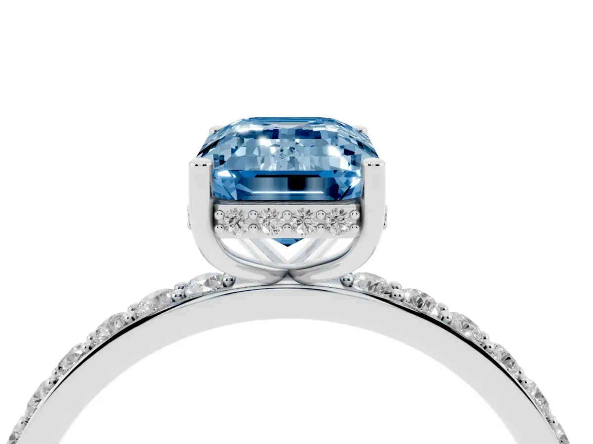 Fancy Blue Emerald Cut Diamond Solitaire Ring with Pavé Band and Hidden Halo White gold