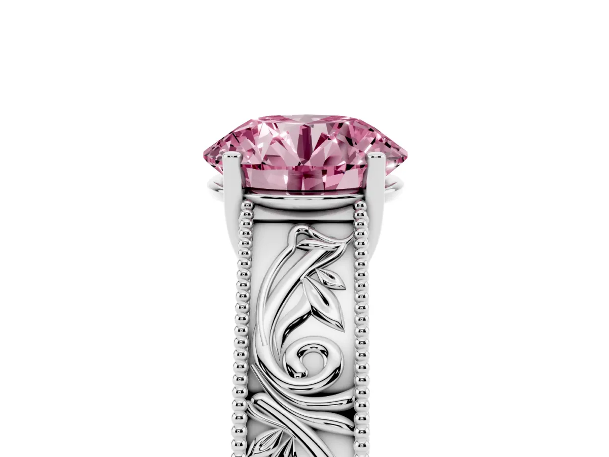 Fancy Pink Round Cut Diamond Solitaire Ring with Engraved Band and Four-Prong Setting White gold