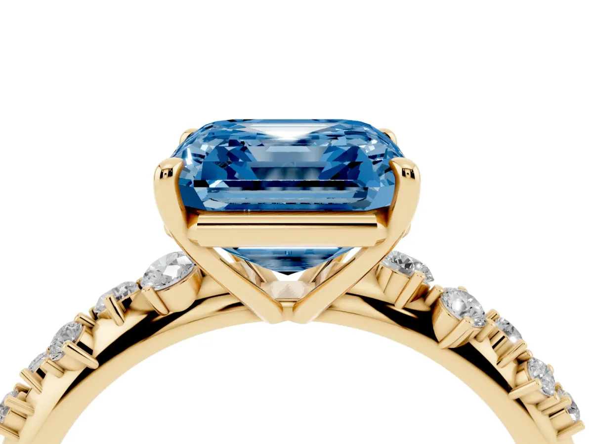 Fancy Blue Asscher Cut Diamond Cluster Side Stone Solitaire Ring with Prong Setting Yellow gold