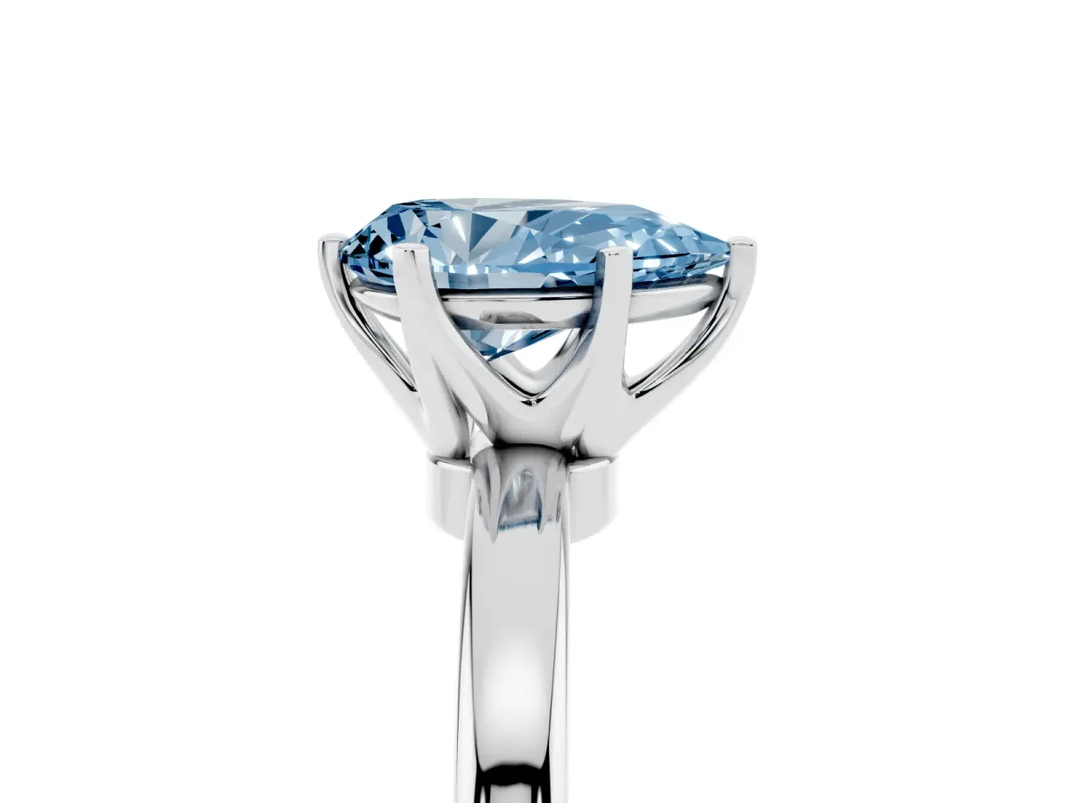 Fancy Blue Pear Cut Solitaire Diamond Ring with Six-Prong Setting on a Classic Band Platinum