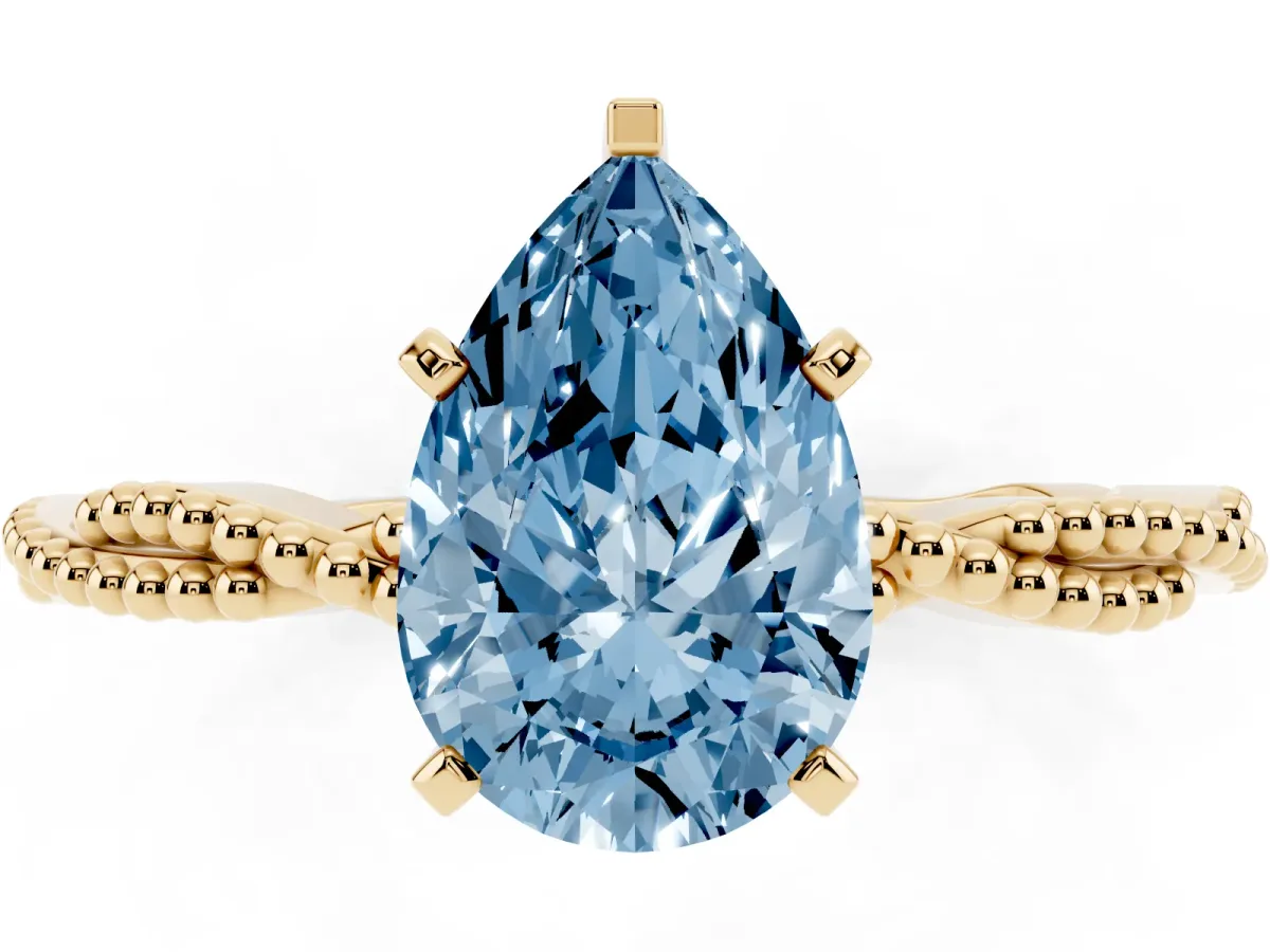 Fancy Blue Pear Cut Solitaire Twisted Band with Bead Prong Setting Yellow gold