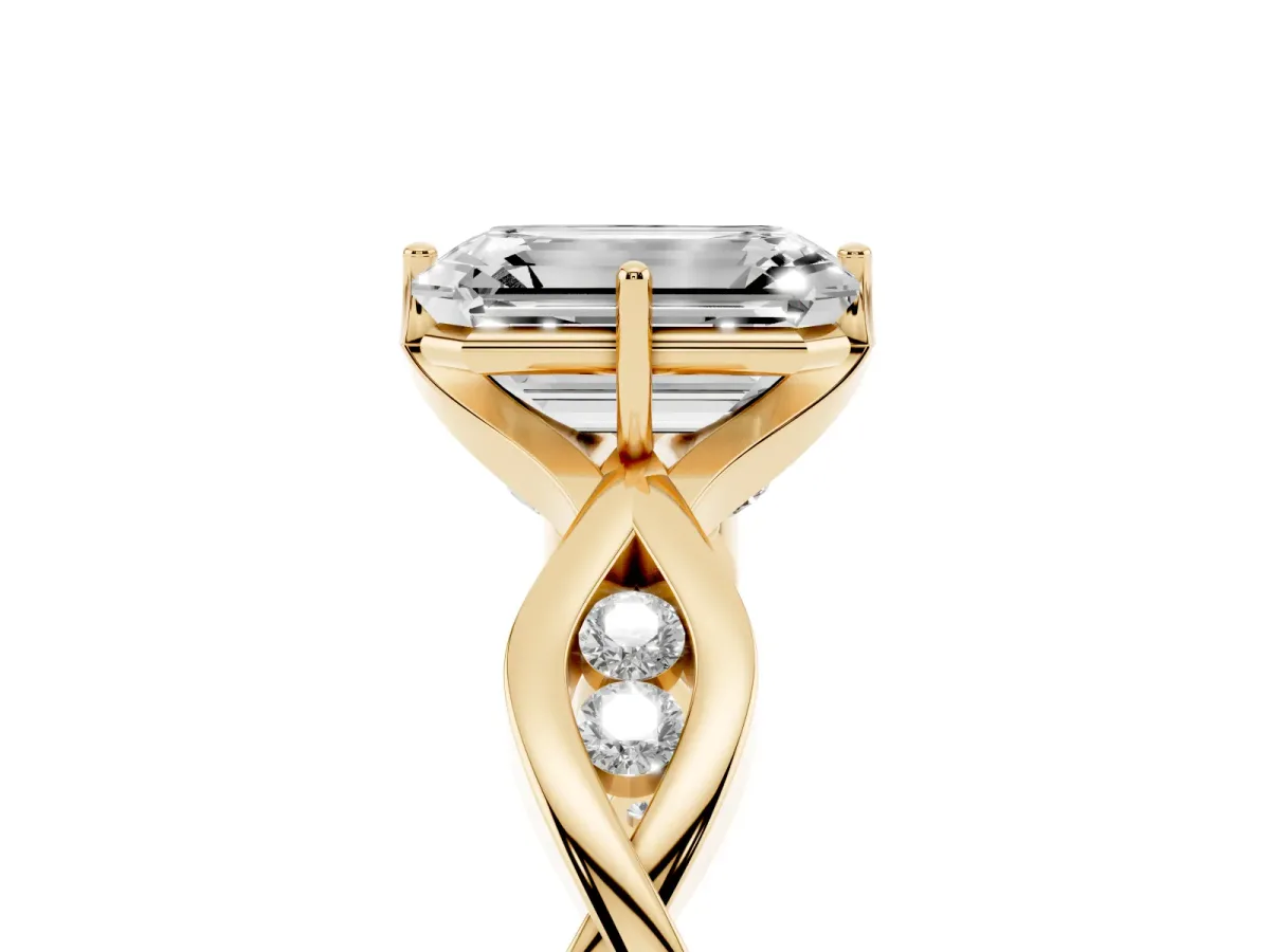 Emerald Cut Solitaire Twist Band with Leaf Prong Setting Yellow gold
