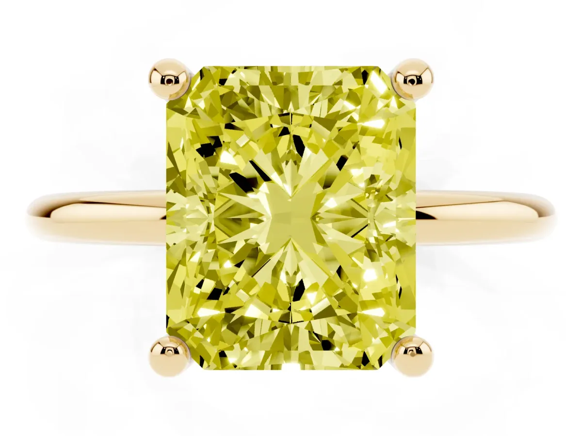 Fancy Yellow Radiant Cut Solitaire Diamond Ring with 4-Prong Setting on a Classic Band Yellow gold