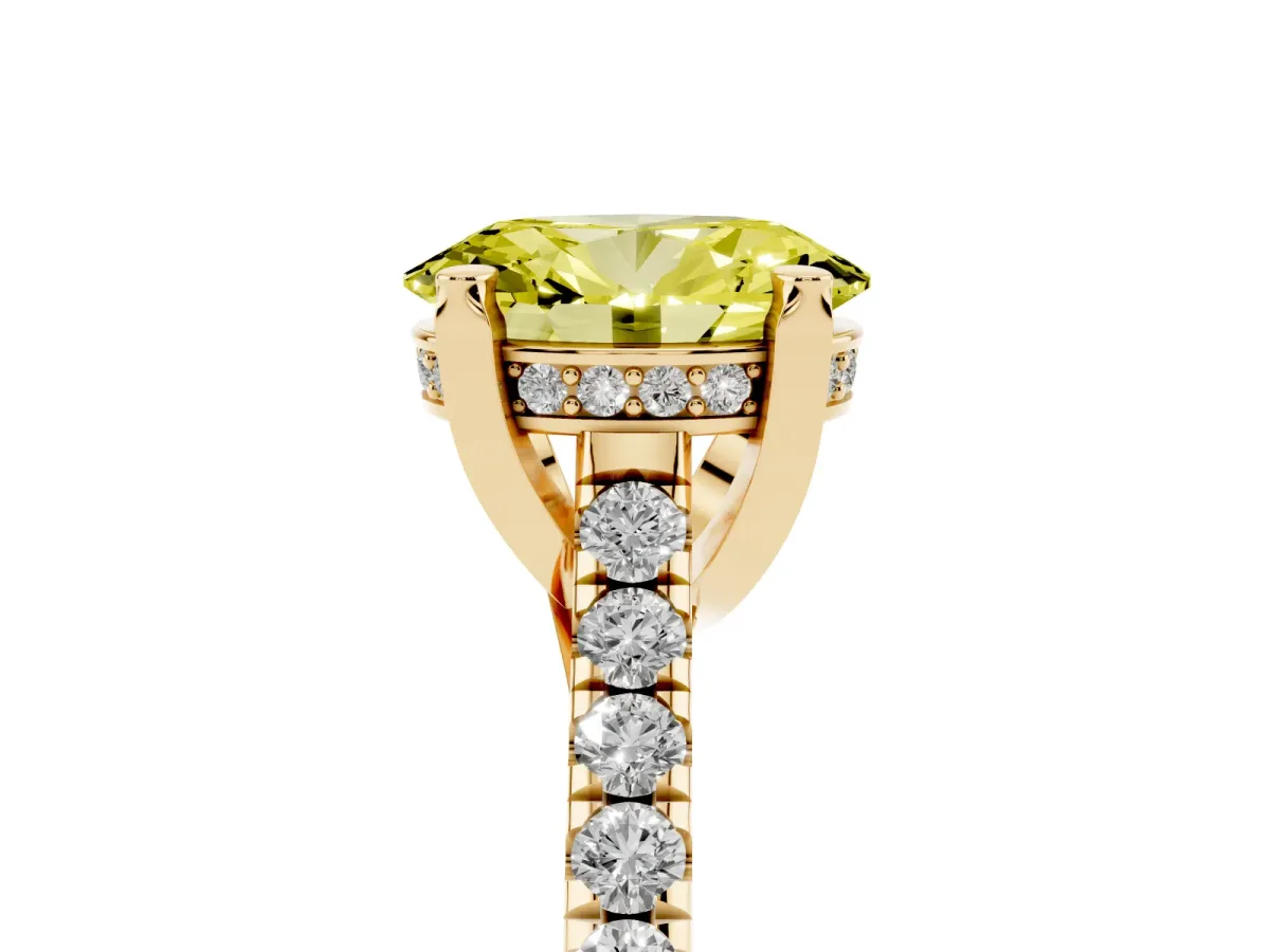 Fancy Yellow Oval Cut Brilliant Diamond Solitaire with Pavé Band and Four-Prong Setting Yellow gold
