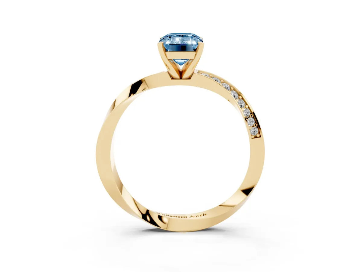 Fancy Blue Emerald Cut Diamond Engagement Ring with Side Stone Accents and Four-Prong Setting Yellow gold