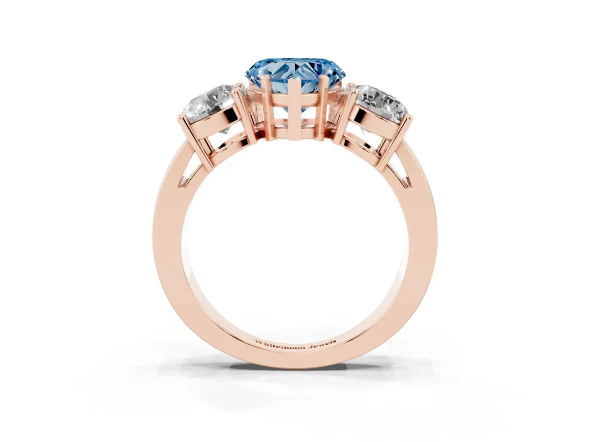 Fancy Blue Three-Stone Heart Cut Diamond Ring with Round Side Stones, Classic Band, and Four-Prong Setting Rose gold