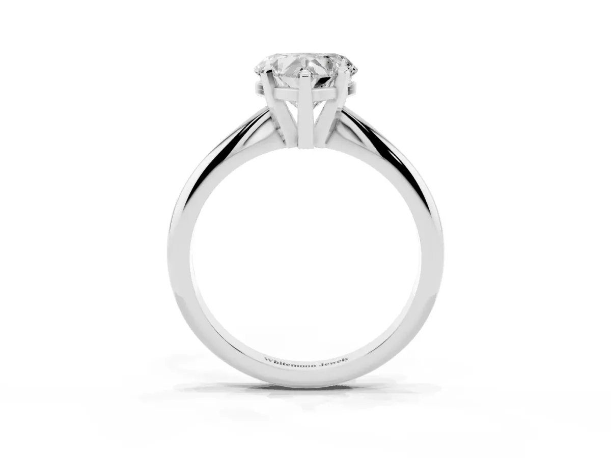 Heart Cut Cut Solitaire Ring with Four-Prong Setting on a Classic Band Silver