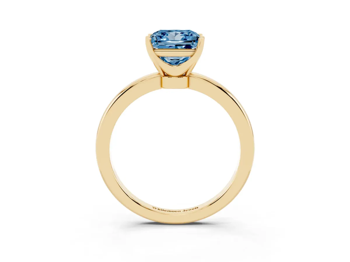Fancy Blue Princess Cut Solitaire Diamond Ring with Six-Prong Setting on a Classic Band Yellow gold