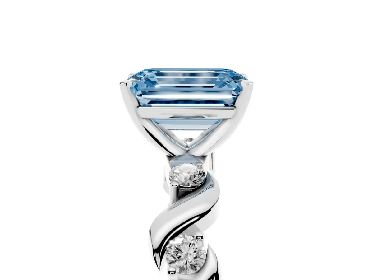 Fancy Blue Emerald Cut Diamond Solitaire Twisted Band with Round Accents and Prong Setting Platinum