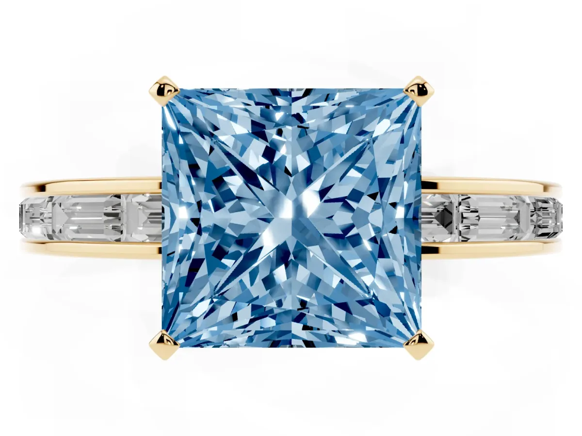 Fancy Blue Princess Cut Solitaire Diamond Ring with Channel-Set Baguette Band and Four-Prong Setting Yellow gold