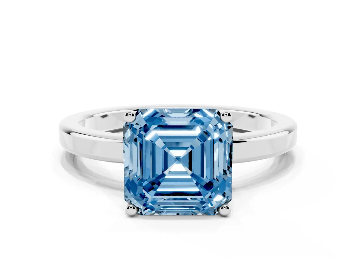 Fancy Blue Asscher Cut Cut Solitaire Engagement Ring with Four-Prong Setting on a Classic Band Silver