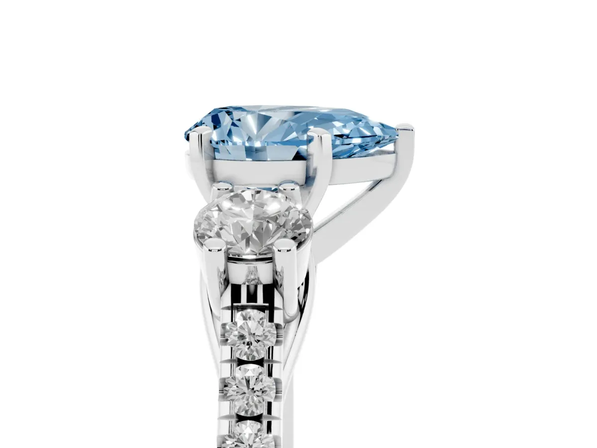 Fancy Blue Three-Stone Pear Cut Diamond Pavé Band with Four-Prong Setting Platinum