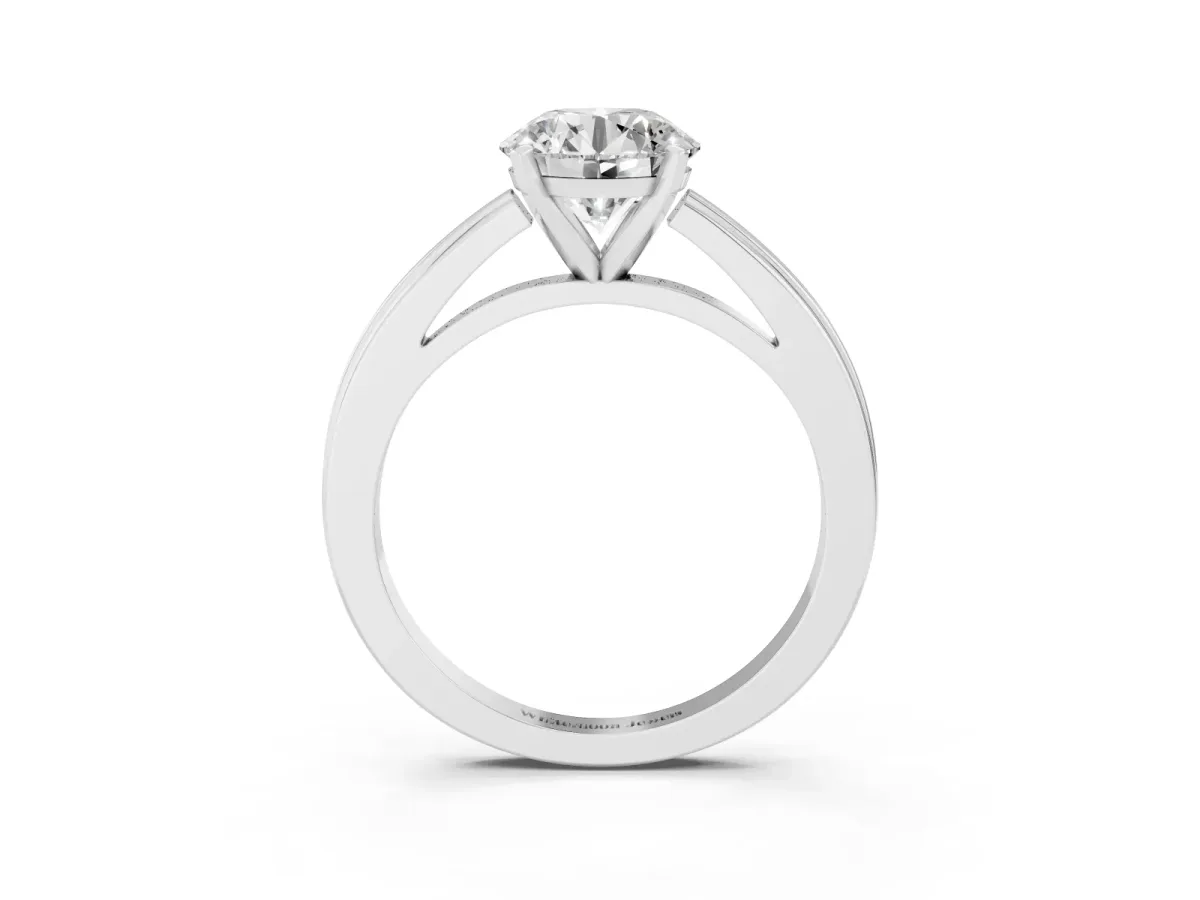 Round Cut Solitaire Diamond Ring with Four-Prong Setting and Classic Band Platinum