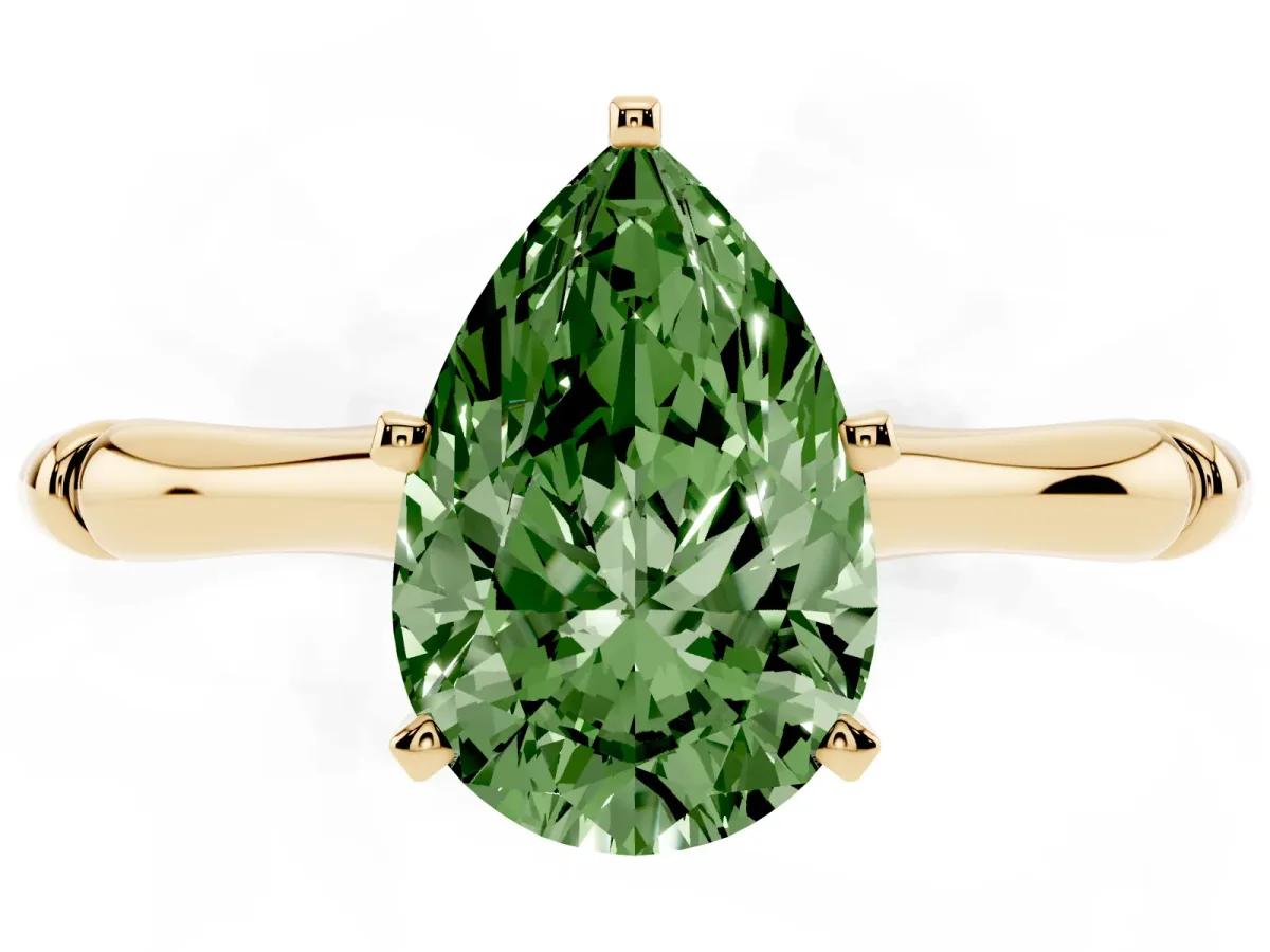 Fancy Green Pear Cut Solitaire Diamond Ring with Bamboo Band and Four-Prong Setting Yellow gold