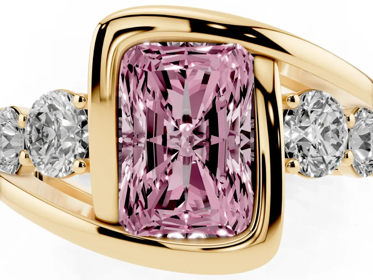 Fancy Pink Bezel Set Radiant Cut Diamond Bypass Ring with Round Accents Yellow gold