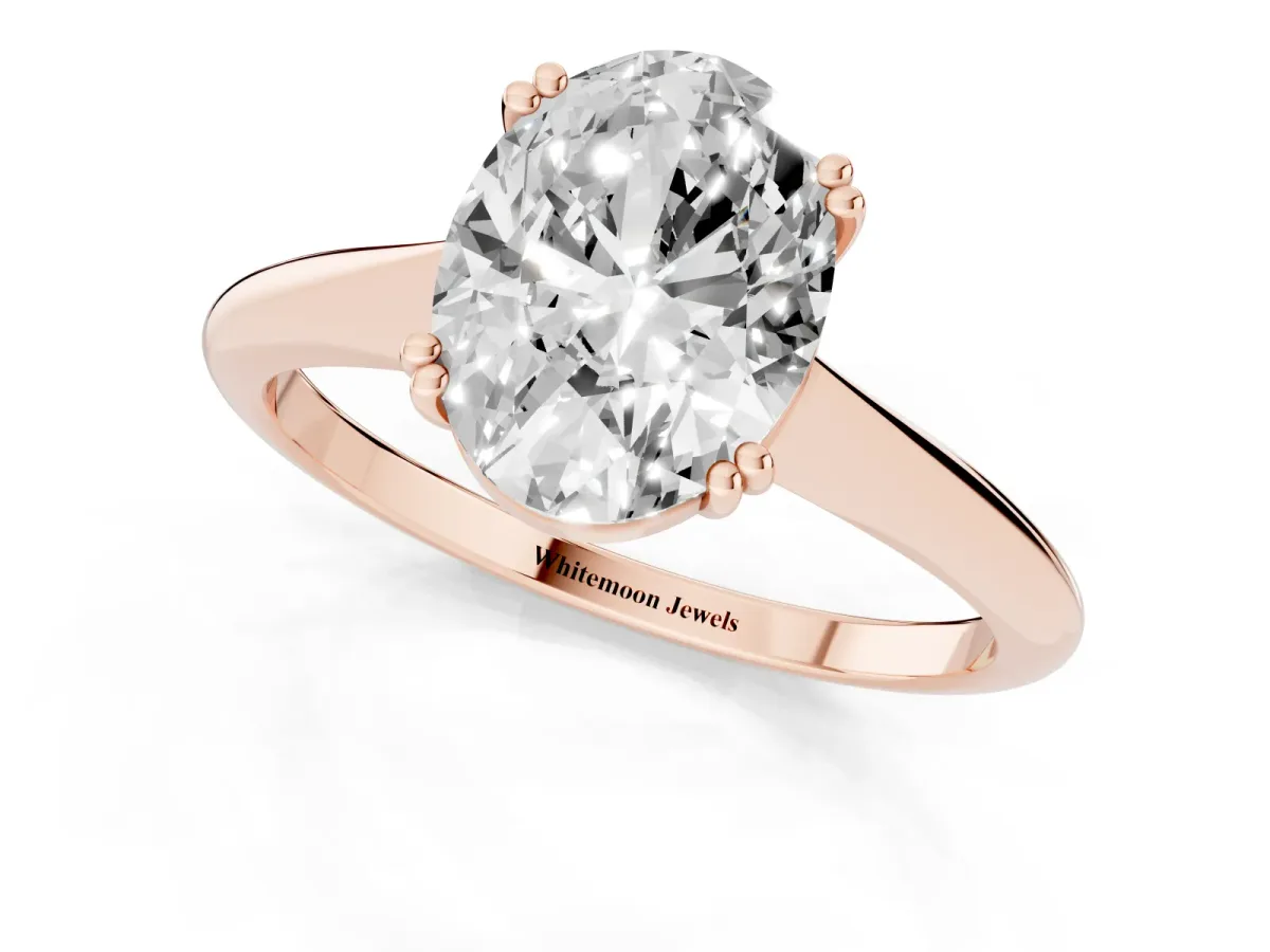 Oval Cut Solitaire Diamond Ring with Six-Prong Setting and Classic Band Rose gold