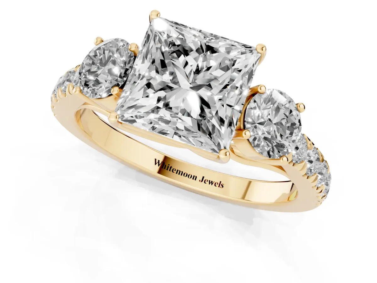 Princess Cut Cut Diamond Three-Stone Ring with Round Side Stones and Pavé Band Yellow gold