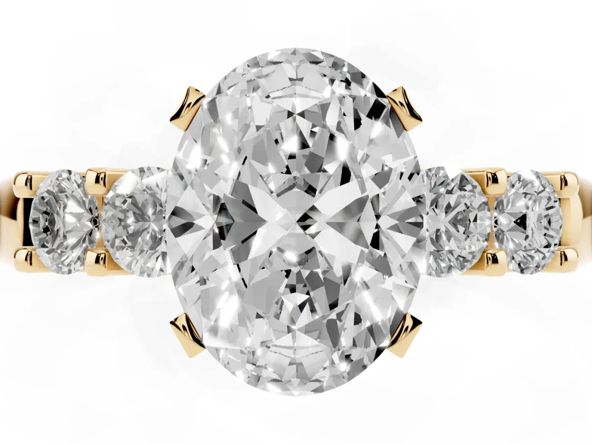 Oval Cut Brilliant Cut Diamond Five-Stone Prong Set Engagement Ring with Channel Band Yellow gold