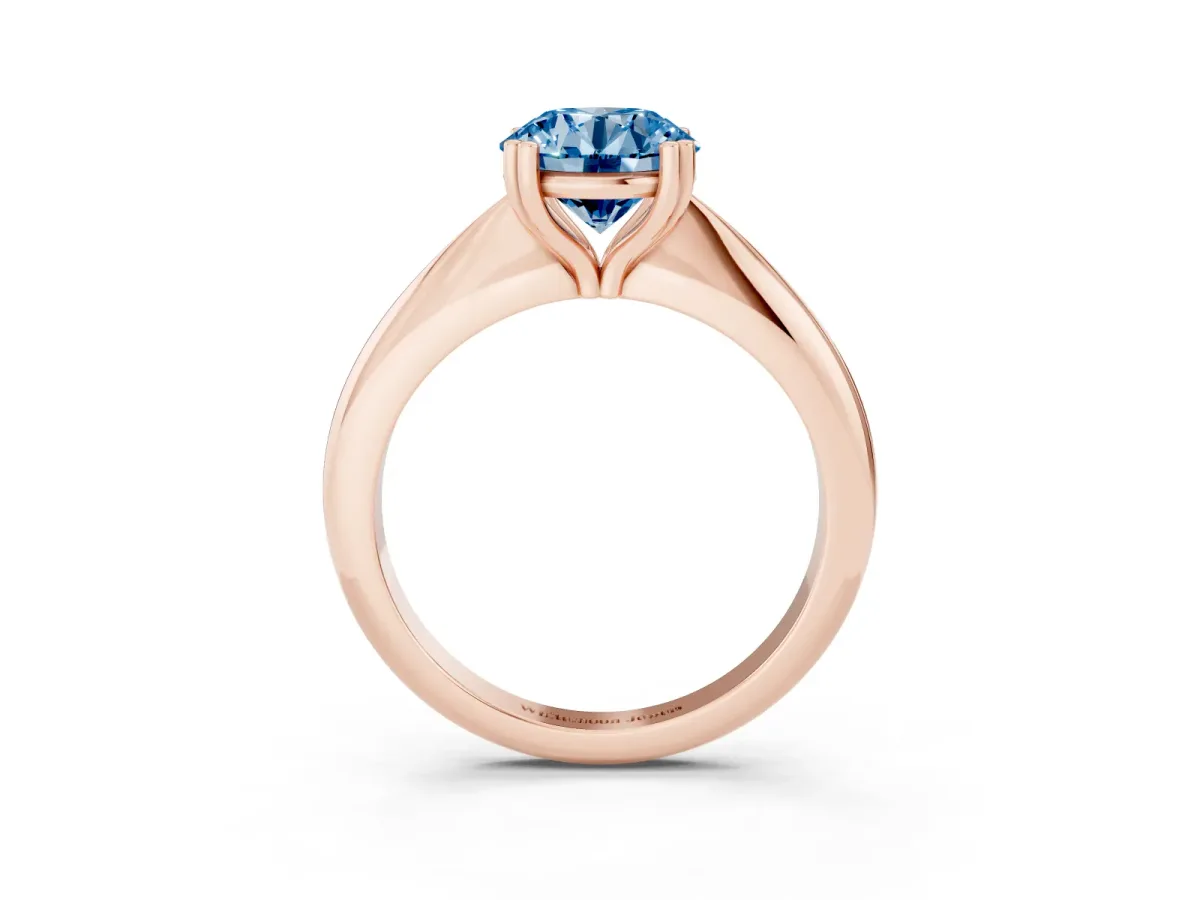 Fancy Blue Round Cut Cut Solitaire Engagement Ring with Tapered Band and Four-Prong Setting Rose gold