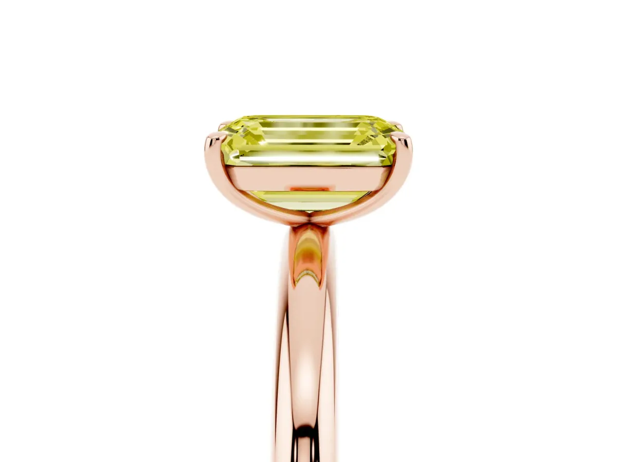 Fancy Yellow Emerald Cut Solitaire Diamond Ring with Four-Prong Setting on a Plain Band Rose gold