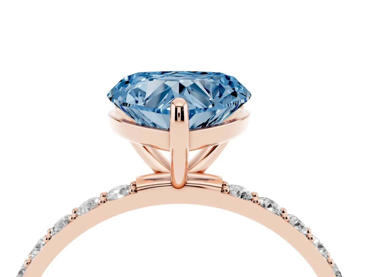 Fancy Blue Heart Cut Diamond Solitaire Ring with Round Pavé Band and Prong Setting Rose gold