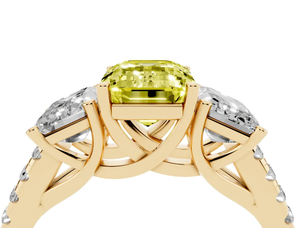 Fancy Yellow Three-Stone Emerald Cut Diamond Ring with Round Pavé Band and Prong Setting Yellow gold