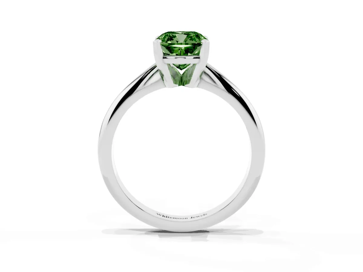 Fancy Green Cushion Cut Cut Solitaire Ring with Four-Prong Setting on a Classic Band Silver