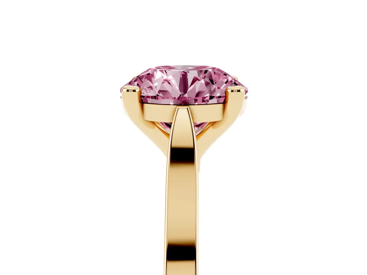 Fancy Pink Round Cut Solitaire Diamond Ring with Four-Prong Setting and Tapered Band Yellow gold