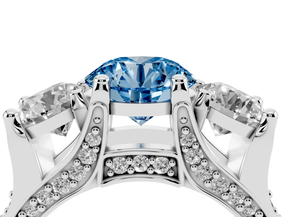Fancy Blue Round Cut Diamond Three-Stone Ring with Channel Set Band and Four-Prong Setting Silver