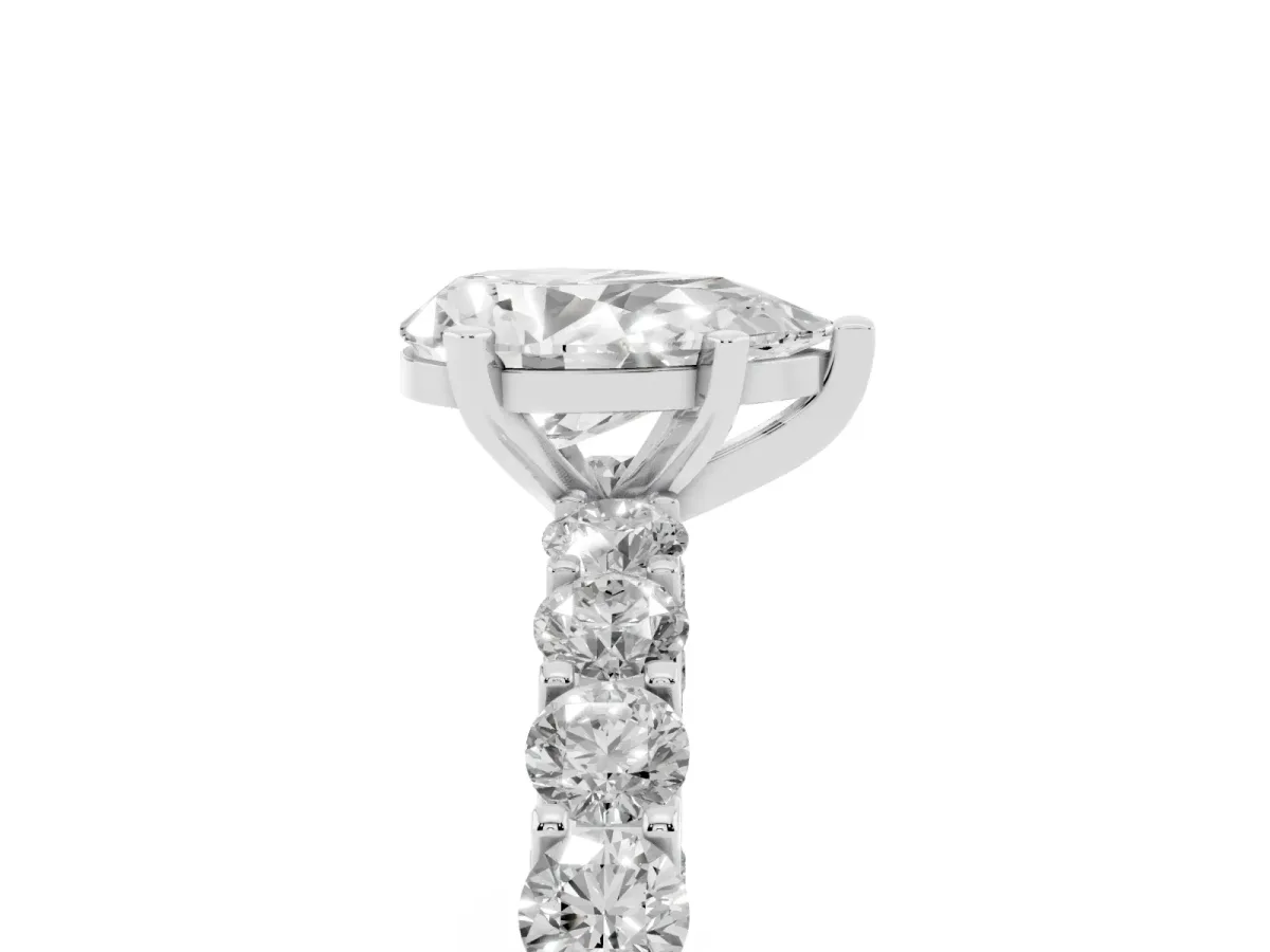 Pear Cut Diamond Solitaire Ring with Shared Prong Pavé Band and Four-Prong Setting Silver