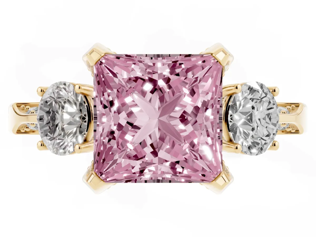 Fancy Pink Princess Cut Brilliant Three-Stone Diamond Ring with Pavé Band and Four-Prong Setting Yellow gold