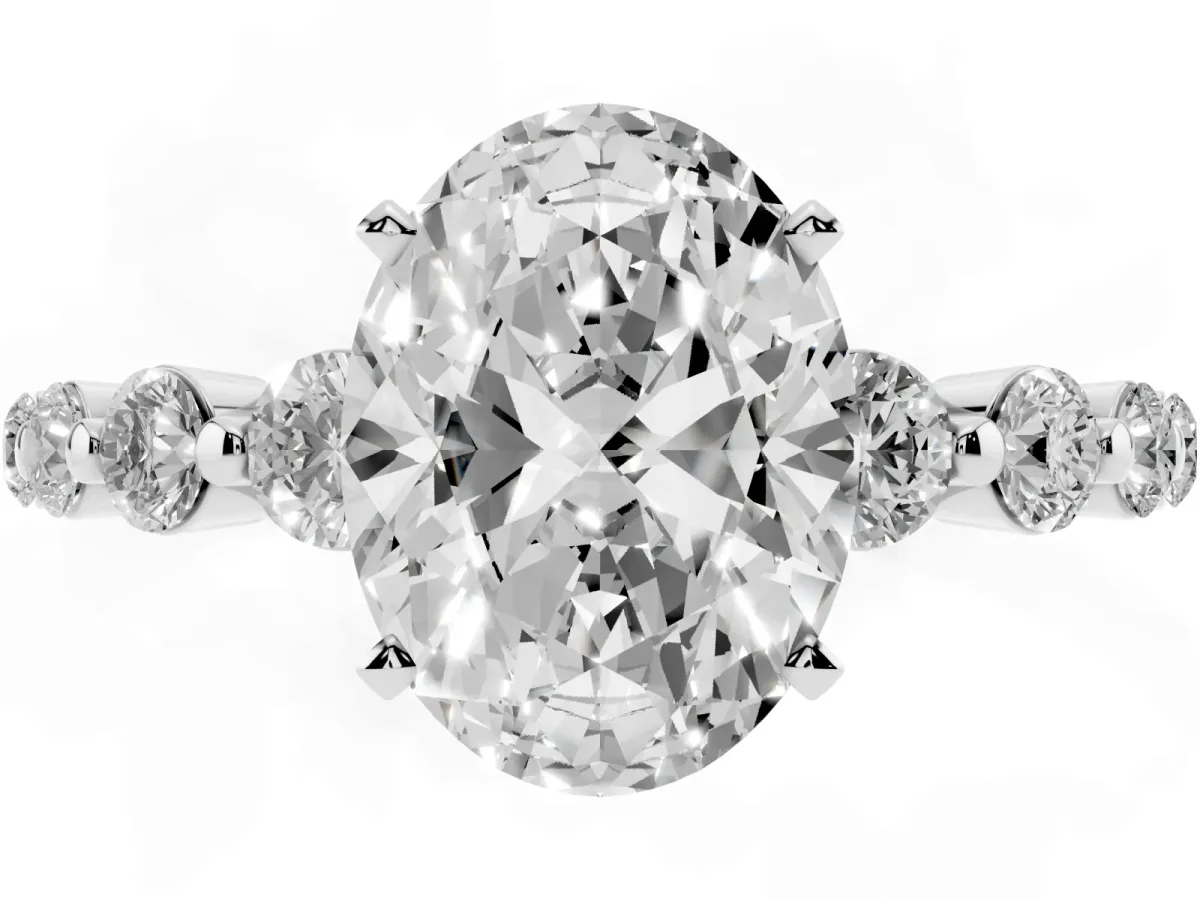 Oval Cut Solitaire Diamond Ring with Pave Band and Four-Prong Setting Silver