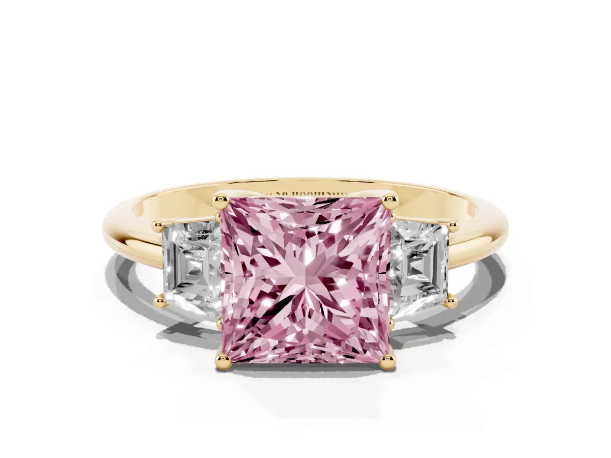 Fancy Pink Princess Cut Diamond Three-Stone Ring with Trapezoid Side Stones and Prong Setting Yellow gold
