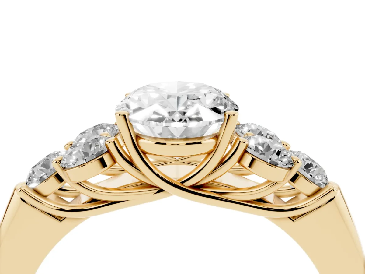 Oval Cut Cut Diamond Cluster Ring with Round Accent Stones and Prong Setting on a Classic Band Yellow gold