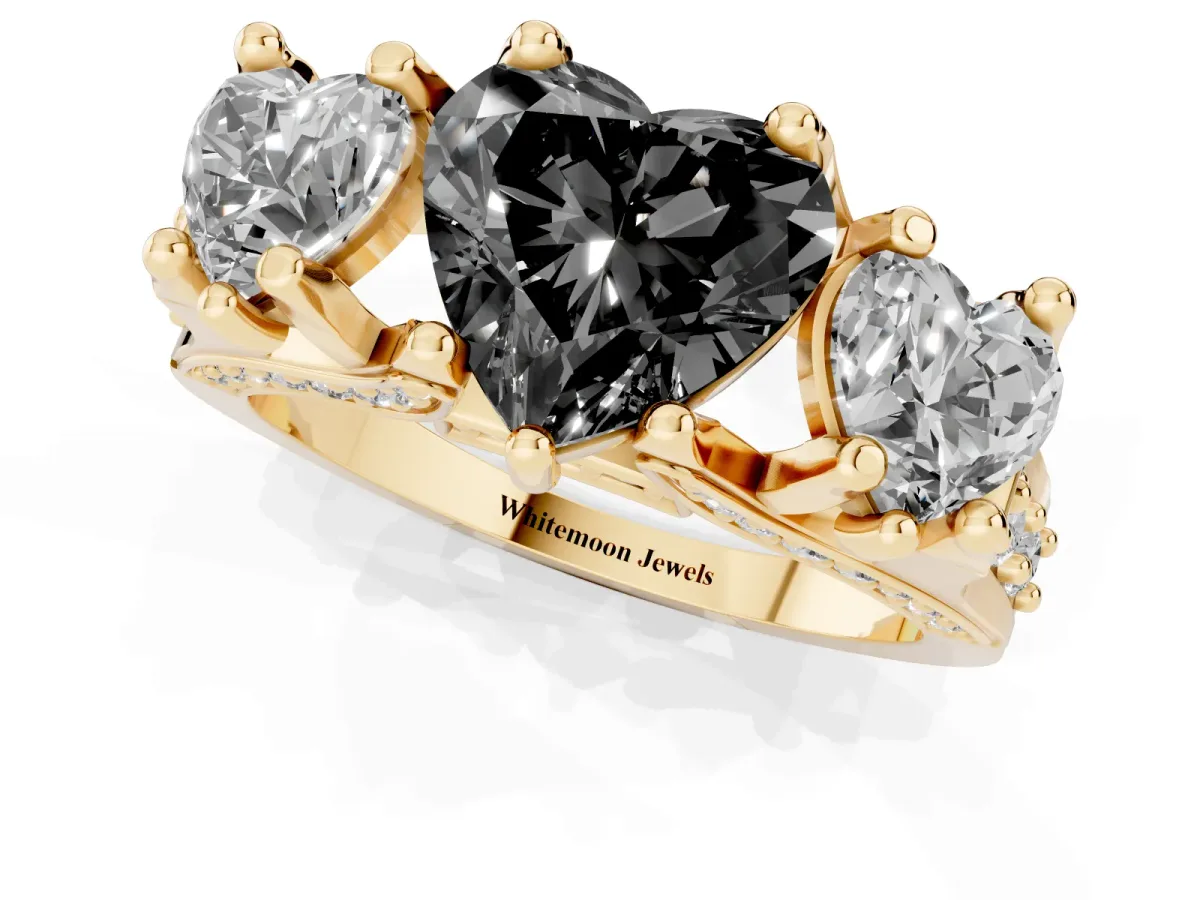 Fancy Black Heart Cut Diamond Three-Stone Ring with Channel Set Band and Four-Prong Setting Yellow gold