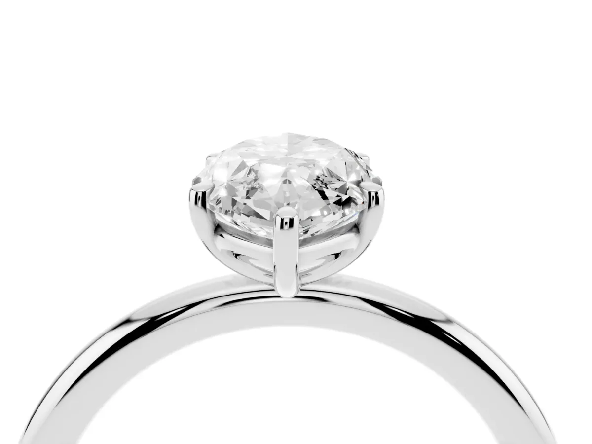 Marquise Cut Solitaire Diamond Ring with Four-Prong Setting on a Plain Band Platinum