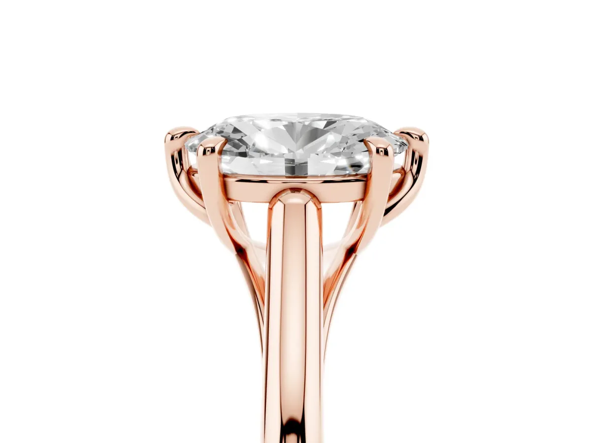 Oval Cut Solitaire Engagement Ring with Six-Prong Setting and Classic Band Rose gold