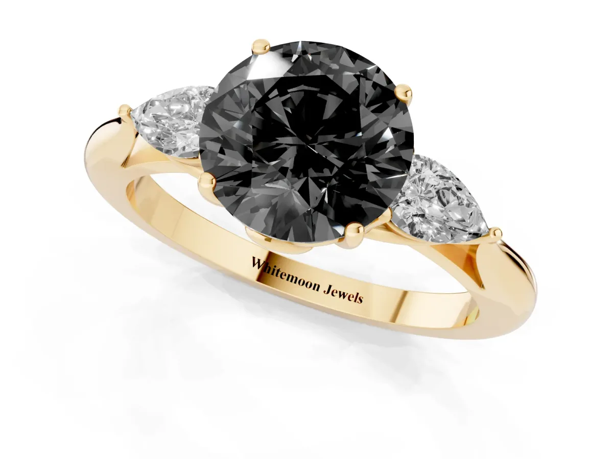 Fancy Black Round Cut Diamond Three-Stone Ring with Pear Side Stones and Prong Setting Yellow gold