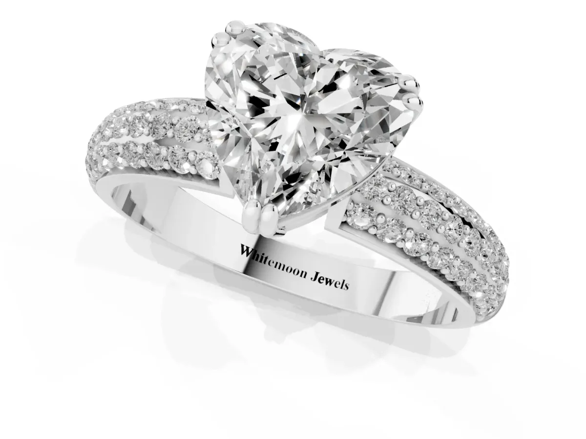 Heart Cut Diamond Solitaire Ring with Multi-Row Round Pavé Band and Prong Setting Silver
