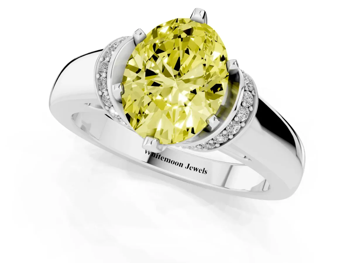 Fancy Yellow Oval Cut Solitaire Diamond Ring with Pave Band and Six-Prong Setting Silver