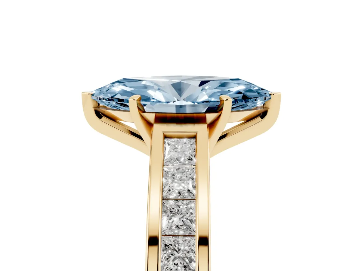 Fancy Blue Marquise Cut Solitaire Diamond Ring with Channel-Set Band and Four-Prong Setting Yellow gold
